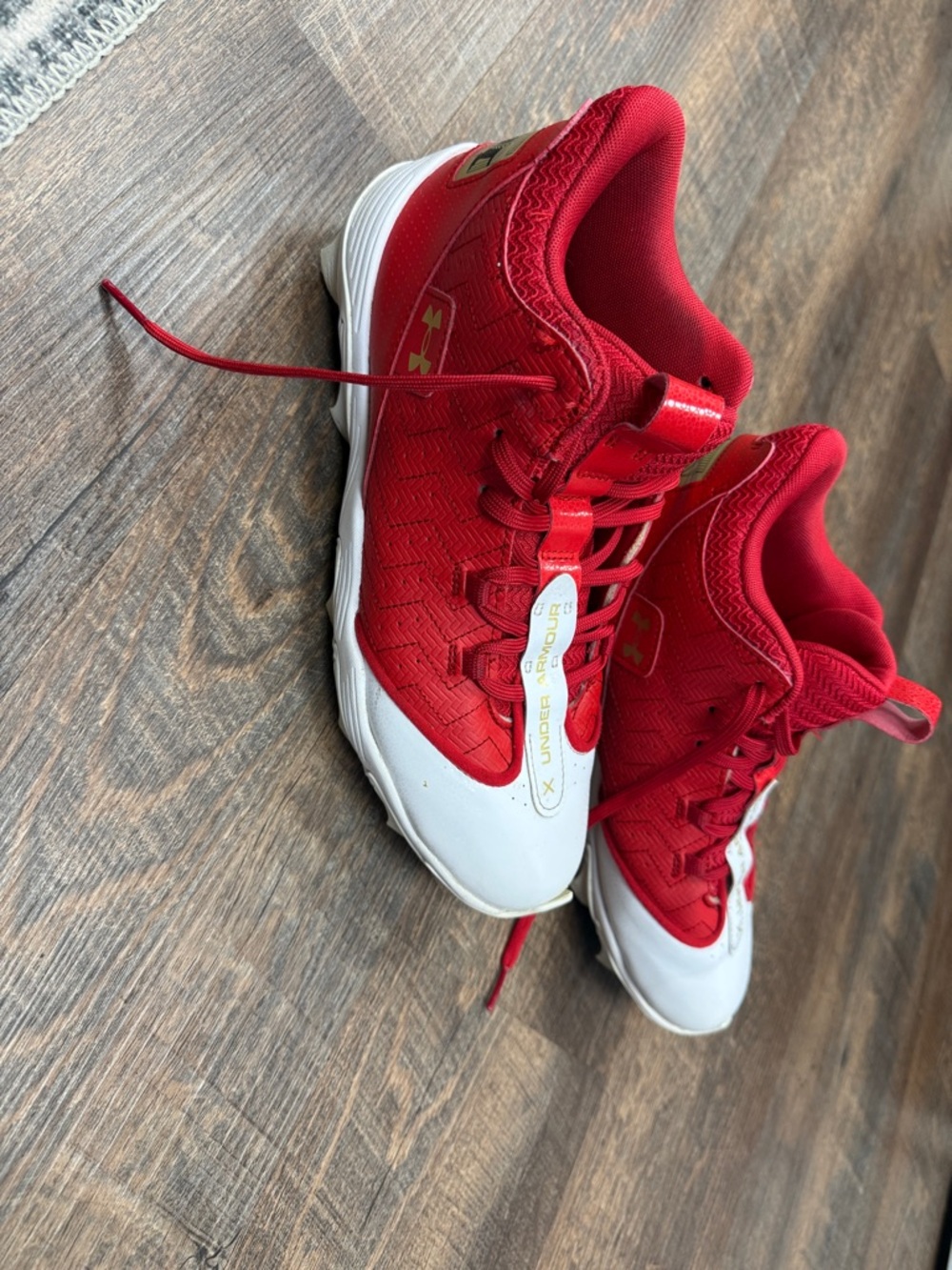 Under Armour Red and White football cleats